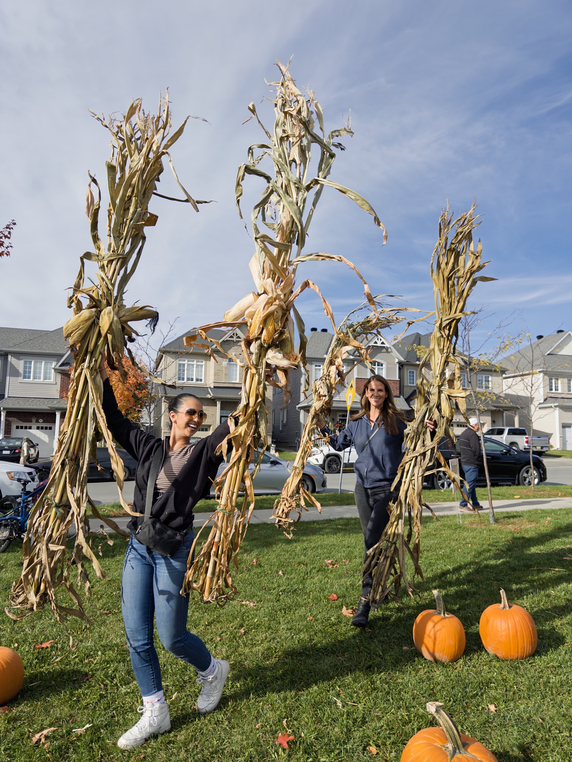 The West Team setting up cornstalk decorations and pumpkins for the annual Pumpkin Pickup