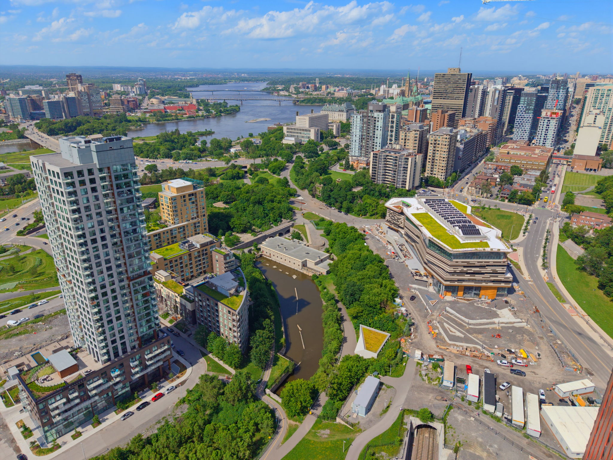 Aerial view of condominium buildings and downtown Ottawa near the Ottawa River